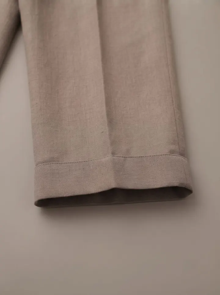 Bemount Taupe Pleated Linen Trouser, hem view in Taupe